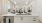 a kitchen with white cabinets