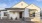 a house with a patio and a walkway