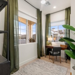 a study nook with many windows