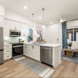 Well-lit kitchen with ample counter space
