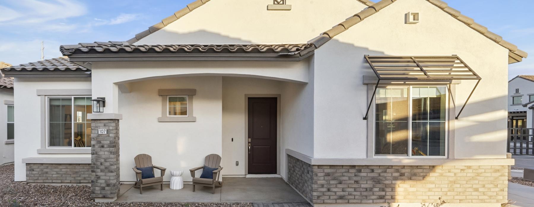 a house with a patio and a walkway