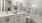 a bathroom with a tub, sink, and toilet