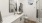a bathroom with a sink, toilet, and shower