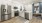 a kitchen with white cabinets
