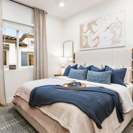 Bedroom with natural lighting and high ceilings